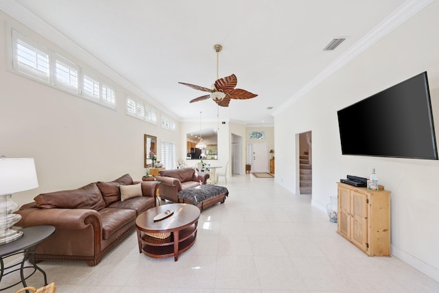 1071 Delray Lakes Dr, Delray Beach, FL 33444 - living area with ornamental molding, a ceiling fan, baseboards, and light tile patterned flooring
