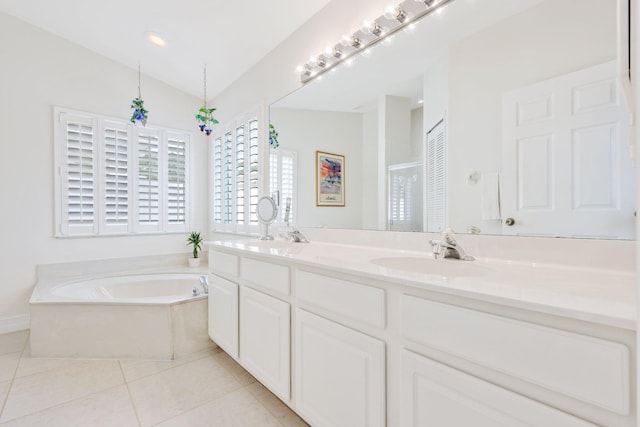 1071 Delray Lakes Dr, Delray Beach, FL 33444 - bathroom with double vanity, a bath, tile patterned floors, and lofted ceiling
