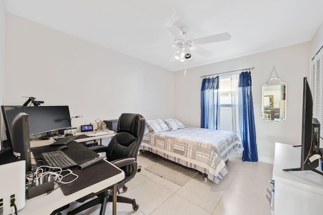 1071 Delray Lakes Dr, Delray Beach, FL 33444 - bedroom featuring light tile patterned floors, a desk, ceiling fan, and baseboards