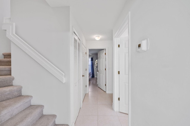 1071 Delray Lakes Dr, Delray Beach, FL 33444 - corridor with stairway and light tile patterned flooring