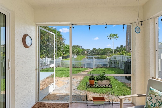 1071 Delray Lakes Dr, Delray Beach, FL 33444 - sunroom / solarium featuring a water view