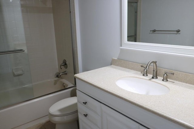 3507 Village Blvd Unit 401, West Palm Beach, FL 33409 - bathroom with vanity, toilet, and enclosed tub / shower combo