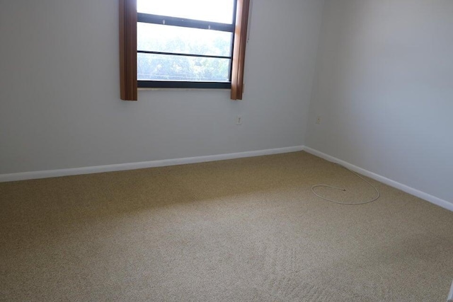 3507 Village Blvd Unit 401, West Palm Beach, FL 33409 - carpeted spare room featuring baseboards