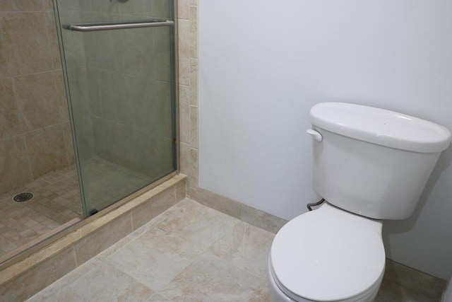 3507 Village Blvd Unit 401, West Palm Beach, FL 33409 - bathroom with toilet and a shower stall