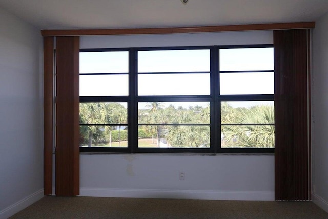 3507 Village Blvd Unit 401, West Palm Beach, FL 33409 - empty room featuring carpet floors and baseboards