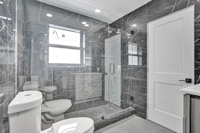 220 Walton Blvd, West Palm Beach, FL 33405 - full bathroom with toilet, a shower stall, recessed lighting, tile patterned flooring, and tile walls