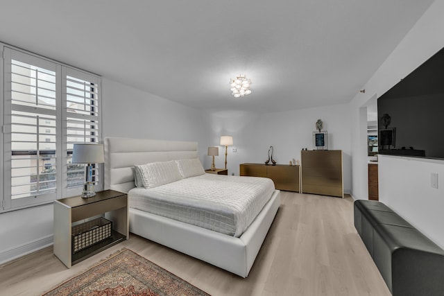 7572 Regency Lake Dr Unit 402, Boca Raton, FL 33433 - bedroom featuring light wood-style floors and baseboards