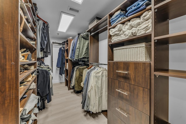 7572 Regency Lake Dr Unit 402, Boca Raton, FL 33433 - spacious closet featuring light wood-style floors