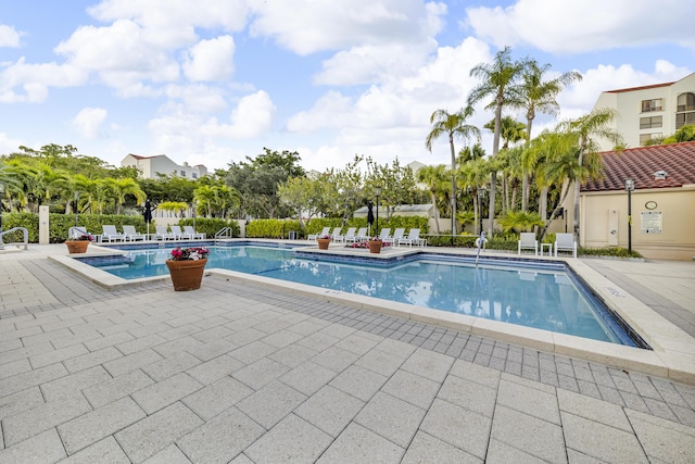 7572 Regency Lake Dr Unit 402, Boca Raton, FL 33433 - community pool with a patio