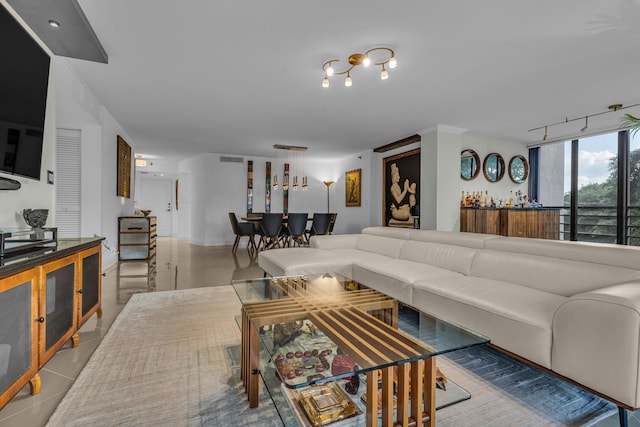 7572 Regency Lake Dr Unit 402, Boca Raton, FL 33433 - tiled living room featuring rail lighting