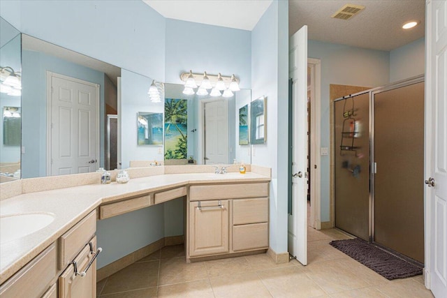 1456 SW Del Rio Blvd, Port Saint Lucie, FL 34953 - full bathroom with double vanity, a shower stall, and tile patterned floors