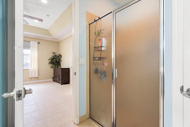 1456 SW Del Rio Blvd, Port Saint Lucie, FL 34953 - full bathroom featuring a shower stall, baseboards, ceiling fan, and tile patterned flooring