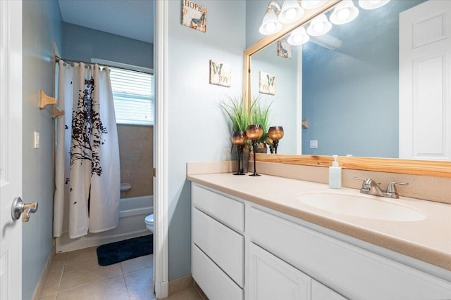1456 SW Del Rio Blvd, Port Saint Lucie, FL 34953 - full bathroom with baseboards, vanity, toilet, tile patterned flooring, and shower / bath combo with shower curtain