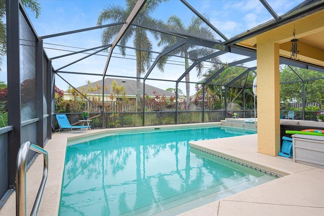 1456 SW Del Rio Blvd, Port Saint Lucie, FL 34953 - outdoor pool with an in-ground hot tub, a patio area, and a lanai