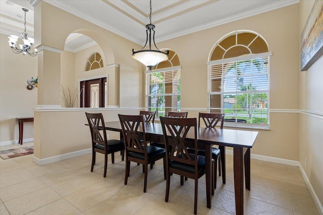 1456 SW Del Rio Blvd, Port Saint Lucie, FL 34953 - tiled dining space featuring crown molding, baseboards, a chandelier, and arched walkways