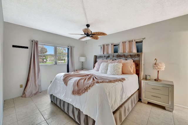 600 Pine Dr Unit 104, Pompano Beach, FL 33060 - bedroom featuring light tile patterned floors, a ceiling fan, and a textured ceiling