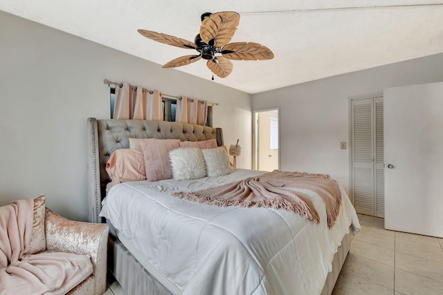 600 Pine Dr Unit 104, Pompano Beach, FL 33060 - bedroom featuring light tile patterned flooring, a ceiling fan, and a closet