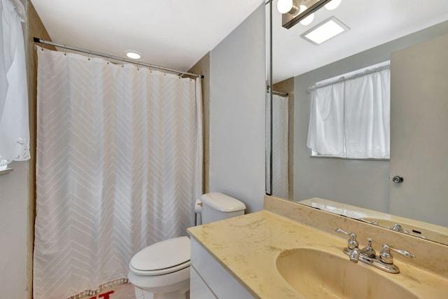 600 Pine Dr Unit 104, Pompano Beach, FL 33060 - bathroom featuring vanity, toilet, and a shower with shower curtain