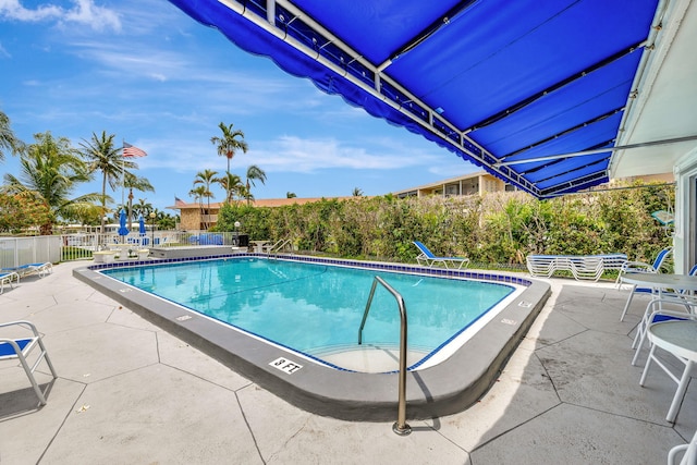 600 Pine Dr Unit 104, Pompano Beach, FL 33060 - community pool featuring a patio area