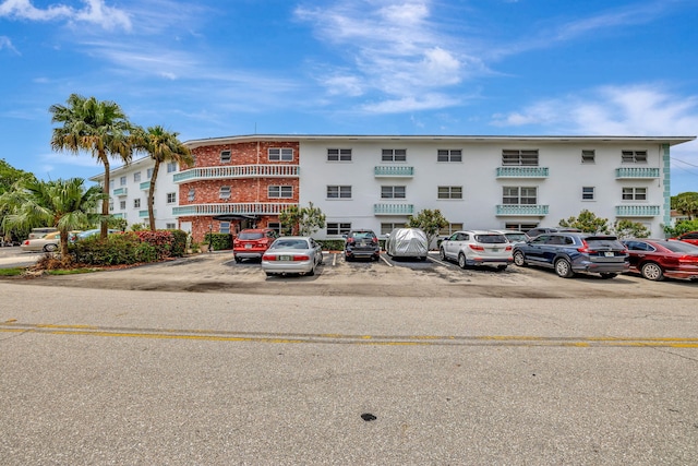 600 Pine Dr Unit 104, Pompano Beach, FL 33060 - view of property with uncovered parking