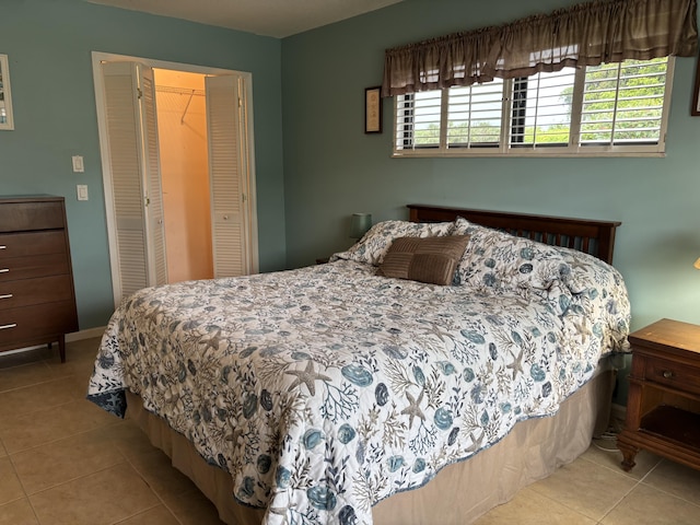 9935 Papaya Tree Trl Unit B, Boynton Beach, FL 33436 - bedroom featuring tile patterned flooring and a closet