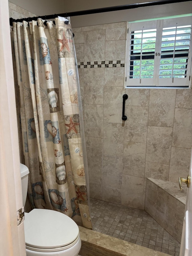 9935 Papaya Tree Trl Unit B, Boynton Beach, FL 33436 - bathroom featuring toilet and tiled shower