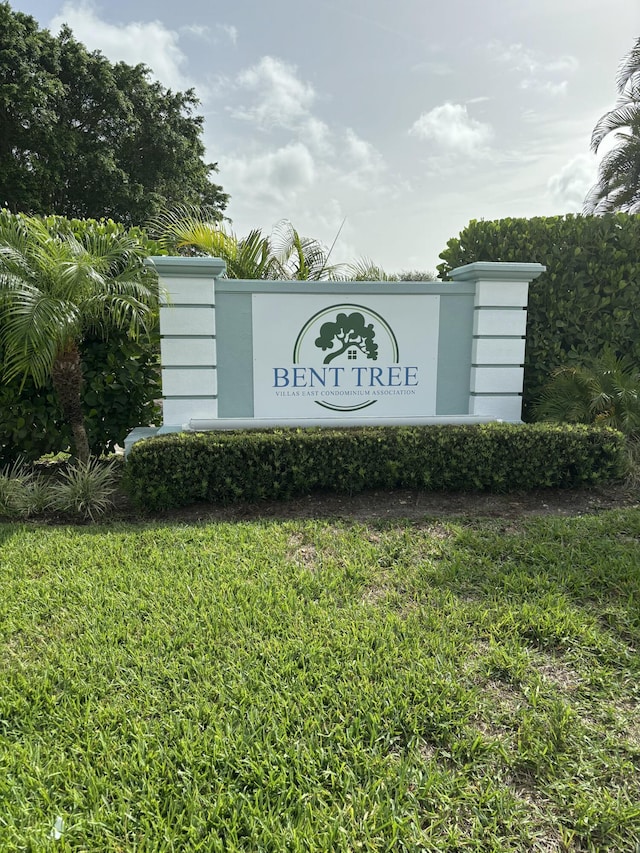 9935 Papaya Tree Trl Unit B, Boynton Beach, FL 33436 - community sign with a yard