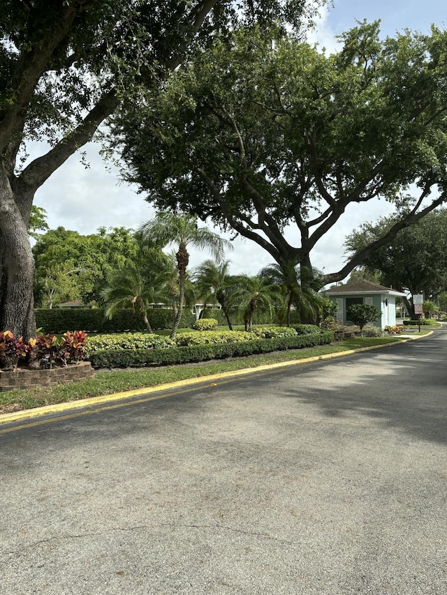 9935 Papaya Tree Trl Unit B, Boynton Beach, FL 33436 - view of asphalt road featuring curbs