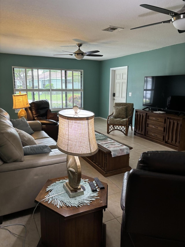 9935 Papaya Tree Trl Unit B, Boynton Beach, FL 33436 - living room featuring a ceiling fan, light tile patterned floors, and a textured ceiling