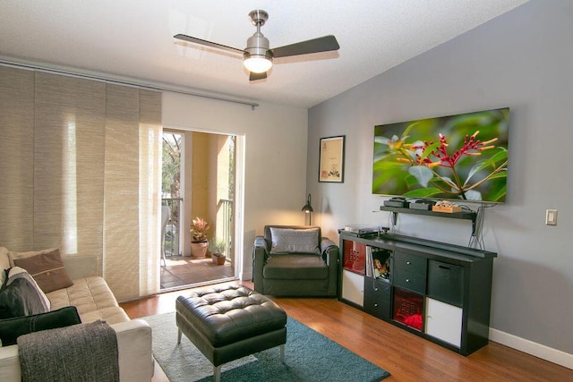 160 Yacht Club Way Unit 309, Hypoluxo, FL 33462 - living room featuring wood finished floors, a ceiling fan, and baseboards