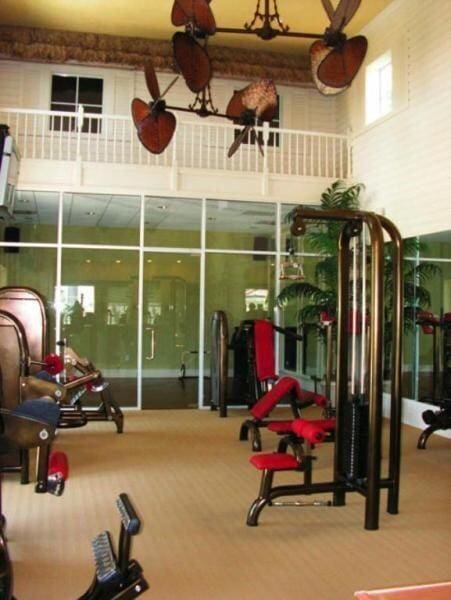 160 Yacht Club Way Unit 309, Hypoluxo, FL 33462 - gym with carpet floors