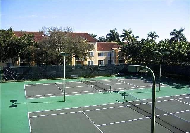 160 Yacht Club Way Unit 309, Hypoluxo, FL 33462 - view of tennis court with community basketball court