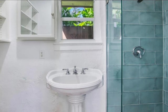 616 Claremore Dr Unit 1, 2, 3, West Palm Beach, FL 33401 - bathroom with a tile shower