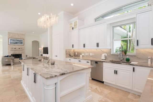 8246 Man O War Rd, Palm Beach Gardens, FL 33418 - kitchen featuring stainless steel dishwasher, a sink, tasteful backsplash, light stone countertops, and open shelves