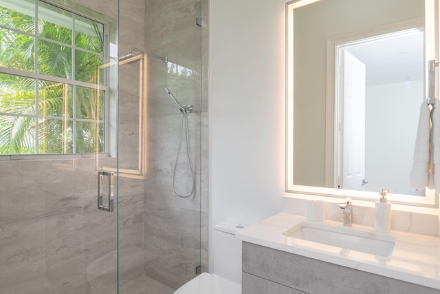 8246 Man O War Rd, Palm Beach Gardens, FL 33418 - full bathroom with a shower stall, vanity, and toilet