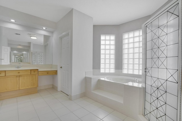 6164 C Durham Dr, Lake Worth, FL 33467 - full bath with a garden tub, tile patterned flooring, vanity, baseboards, and recessed lighting