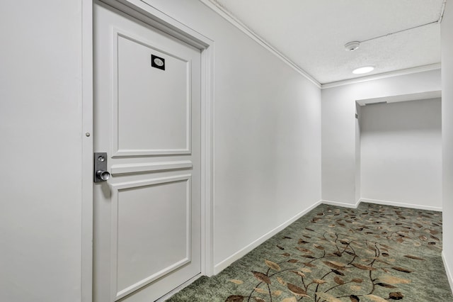 3589 S Ocean Blvd Unit 908, South Palm Beach, FL 33480 - hallway featuring crown molding, baseboards, and carpet