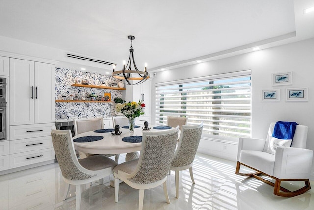 875 E Camino Real Unit 3E, Boca Raton, FL 33432 - dining area with a chandelier