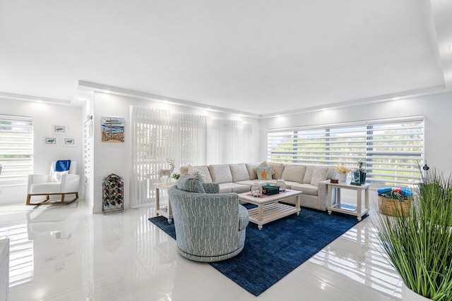 875 E Camino Real Unit 3E, Boca Raton, FL 33432 - living room with healthy amount of natural light, ornamental molding, and tile patterned floors