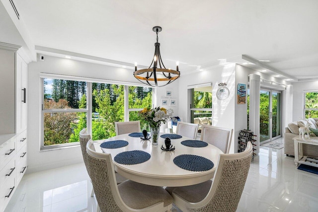 875 E Camino Real Unit 3E, Boca Raton, FL 33432 - dining room featuring a chandelier