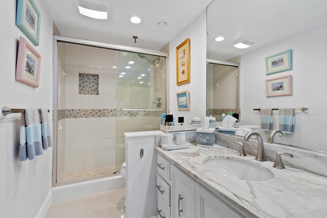 899 Jeffery St Unit 301, Boca Raton, FL 33487 - bathroom featuring vanity, a stall shower, toilet, and recessed lighting