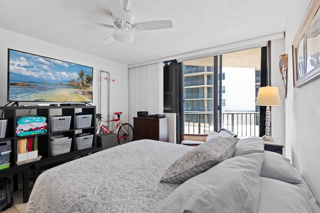 899 Jeffery St Unit 301, Boca Raton, FL 33487 - bedroom with a textured ceiling and a ceiling fan