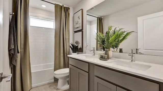 1681 Whistlegrass Ln, Loxahatchee, FL 33470 - full bathroom with double vanity, shower / bath combo, and toilet
