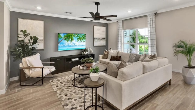 1681 Whistlegrass Ln, Loxahatchee, FL 33470 - living area with wood finished floors, ceiling fan, crown molding, baseboards, and recessed lighting