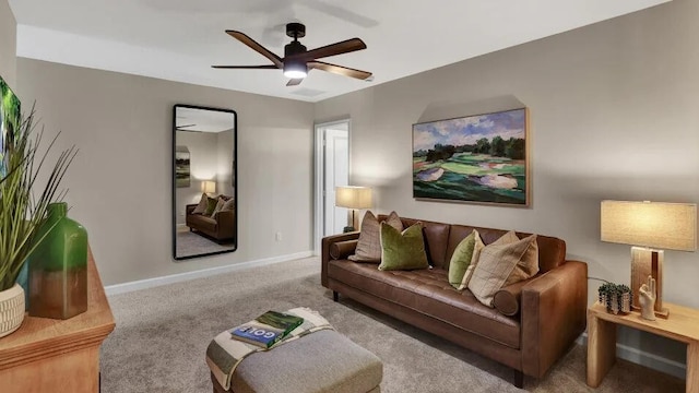 1681 Whistlegrass Ln, Loxahatchee, FL 33470 - living area with carpet flooring, ceiling fan, and baseboards