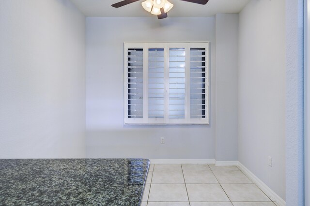 370 Golfview Rd Unit 103, North Palm Beach, FL 33408 - unfurnished room with a ceiling fan and light tile patterned floors