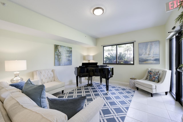 370 Golfview Rd Unit 103, North Palm Beach, FL 33408 - living room featuring tile patterned flooring and baseboards