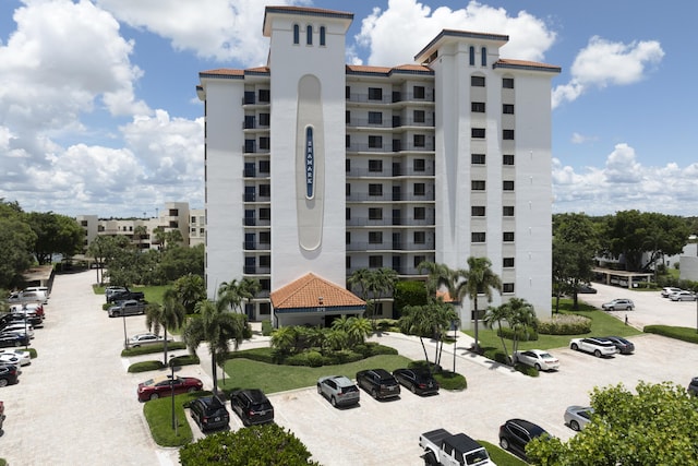 370 Golfview Rd Unit 103, North Palm Beach, FL 33408 - view of property with uncovered parking