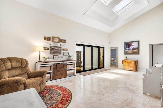 2626 NW 42nd St, Boca Raton, FL 33434 - living area featuring high vaulted ceiling, a skylight, baseboards, and light tile patterned floors
