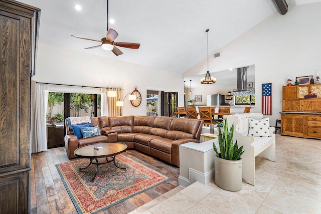 2626 NW 42nd St, Boca Raton, FL 33434 - living room featuring high vaulted ceiling, ceiling fan, a chandelier, and beam ceiling